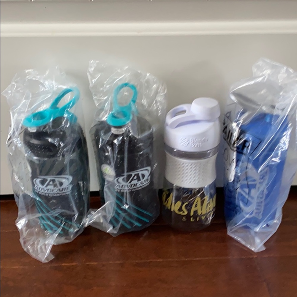 Lot of 4 AdvoCare shaker bottles New/never used!